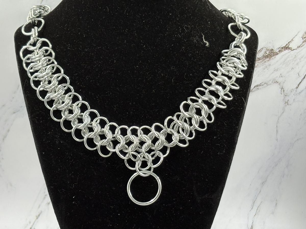 Bright aluminum chainmaille necklace with a ring drop